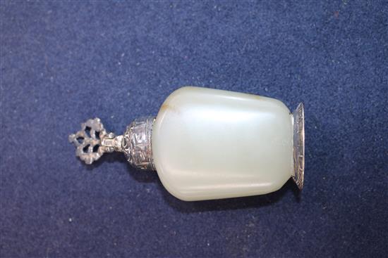 A Chinese jade snuff bottle and a Chinese jade prunus trunk-shaped vase